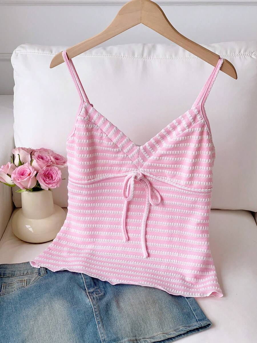 Black and white polka dot tie strap camisole top for women with thin spaghetti straps and slim fit.