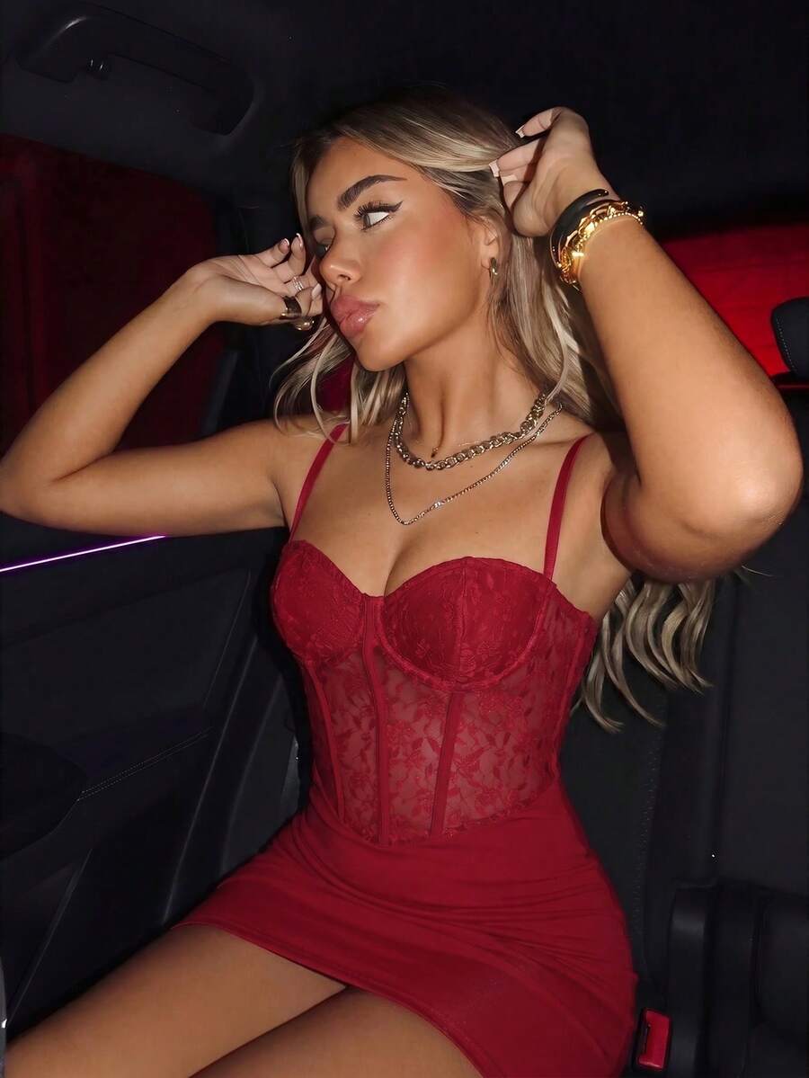 Black contrast lace bustier cami bodycon mini dress for women featuring spaghetti straps and a backless design.