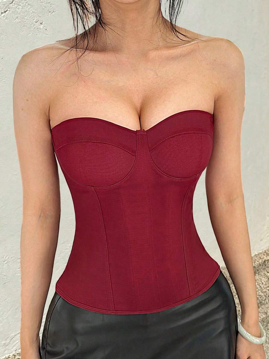 Red strapless corset top with boning and lace-up back, slim fit cropped tube top for women.