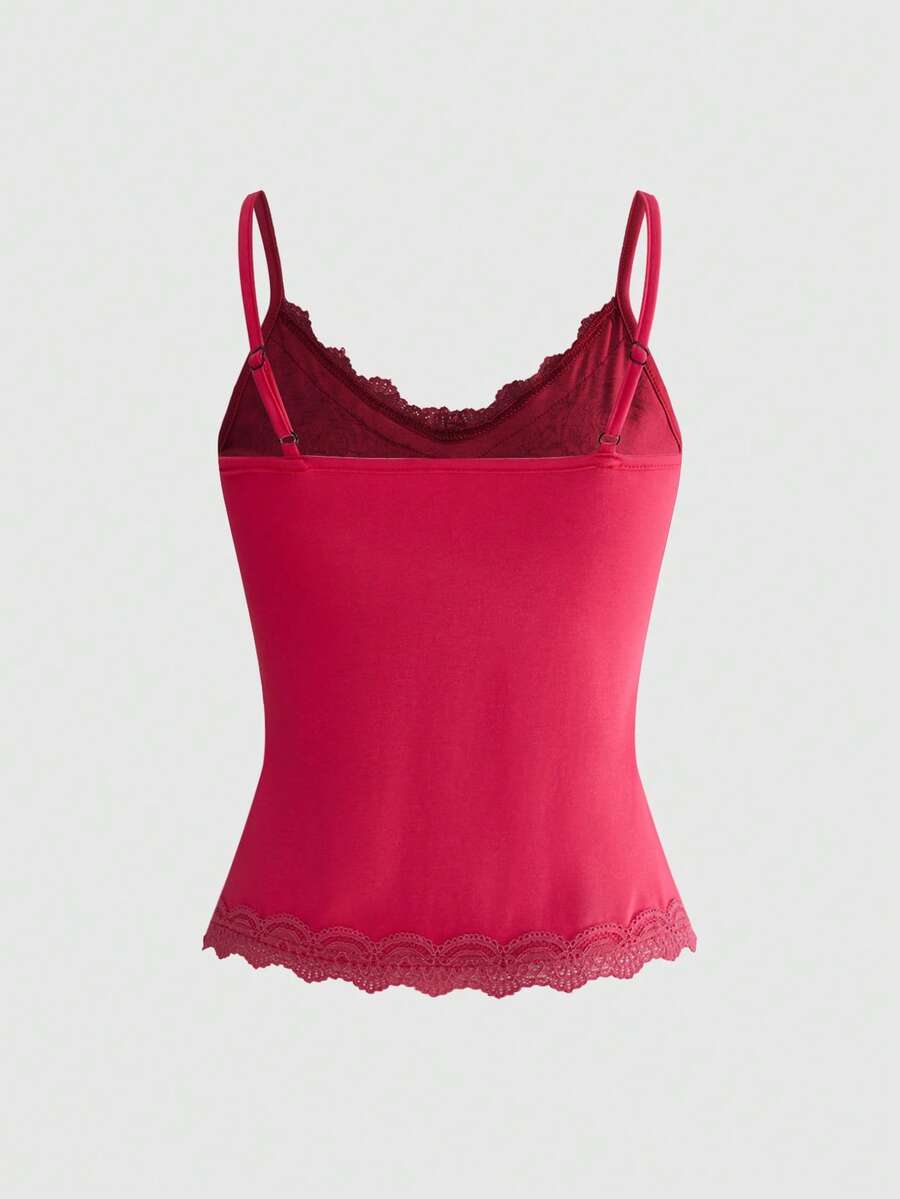 Pink floral print crop camisole top for women featuring contrast lace trim, spaghetti straps, and a slim fit.