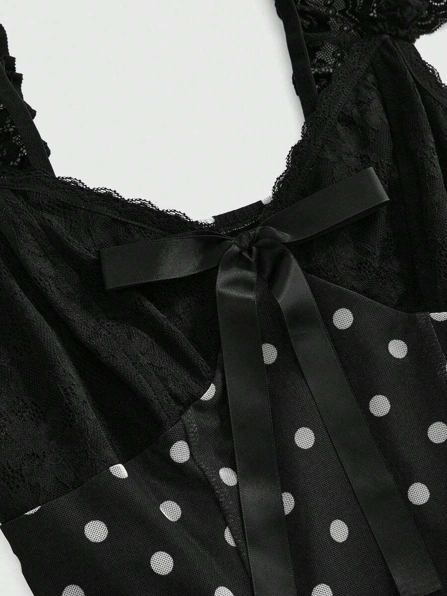 Gothic style lace patchwork sleeveless mini dress for women featuring a sweetheart neckline, high waist flared hem, contrast lace, bow, and knot details.