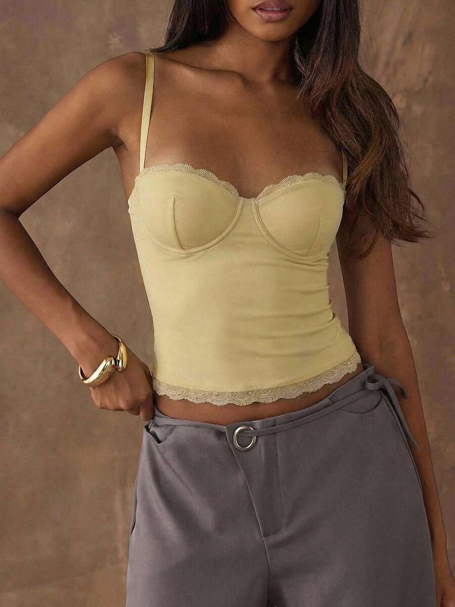Women's black contrast lace camisole with spaghetti straps, cup detail, semi-sheer finish, and slim fit for going out or date night.