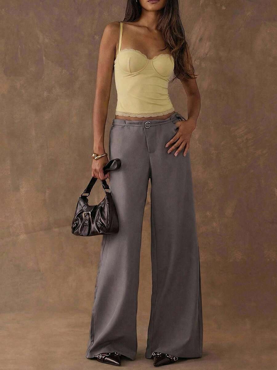 Women's black contrast lace camisole with spaghetti straps, cup detail, semi-sheer finish, and slim fit for going out or date night.