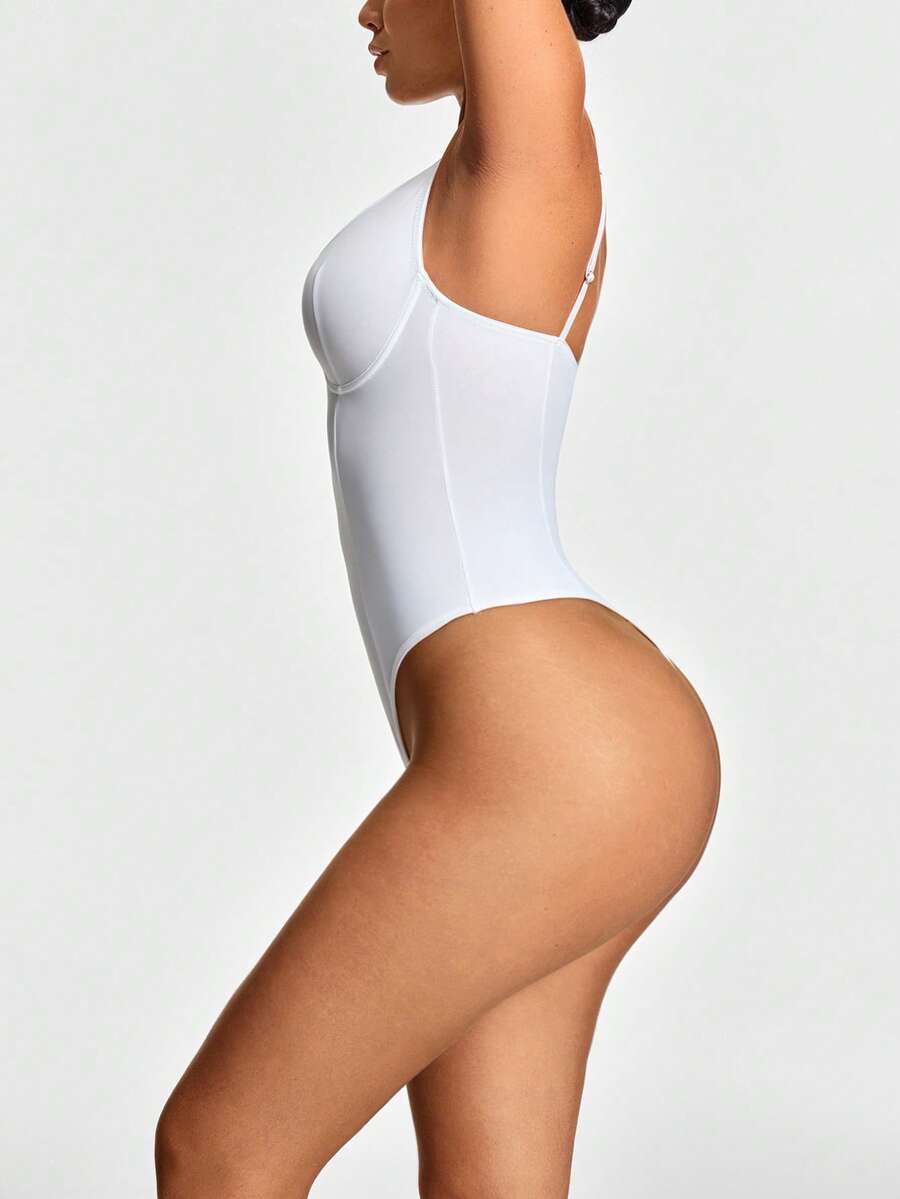 Apricot backless shapewear bodysuit with thong cut, cup details, and high-stretch fabric for light tummy support.