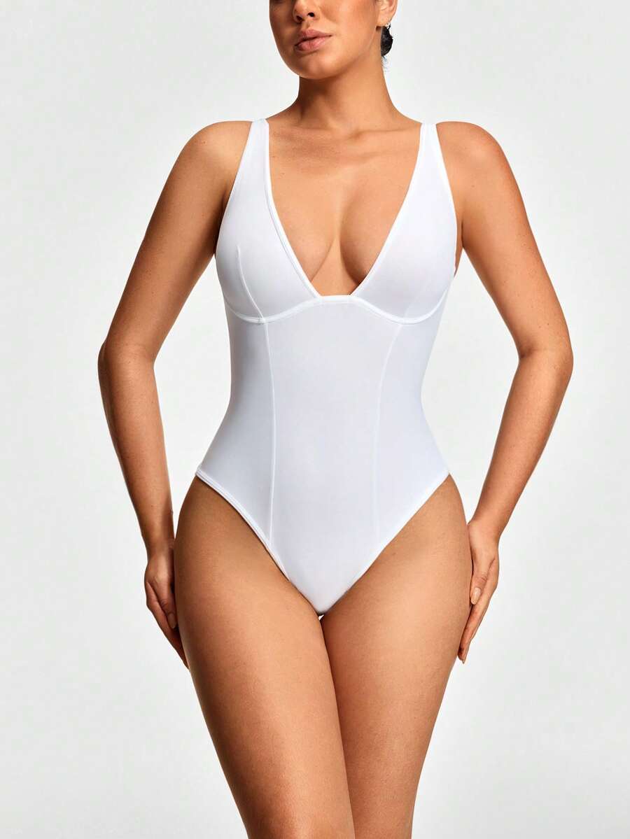 Apricot backless shapewear bodysuit with thong cut, cup details, and high-stretch fabric for light tummy support.
