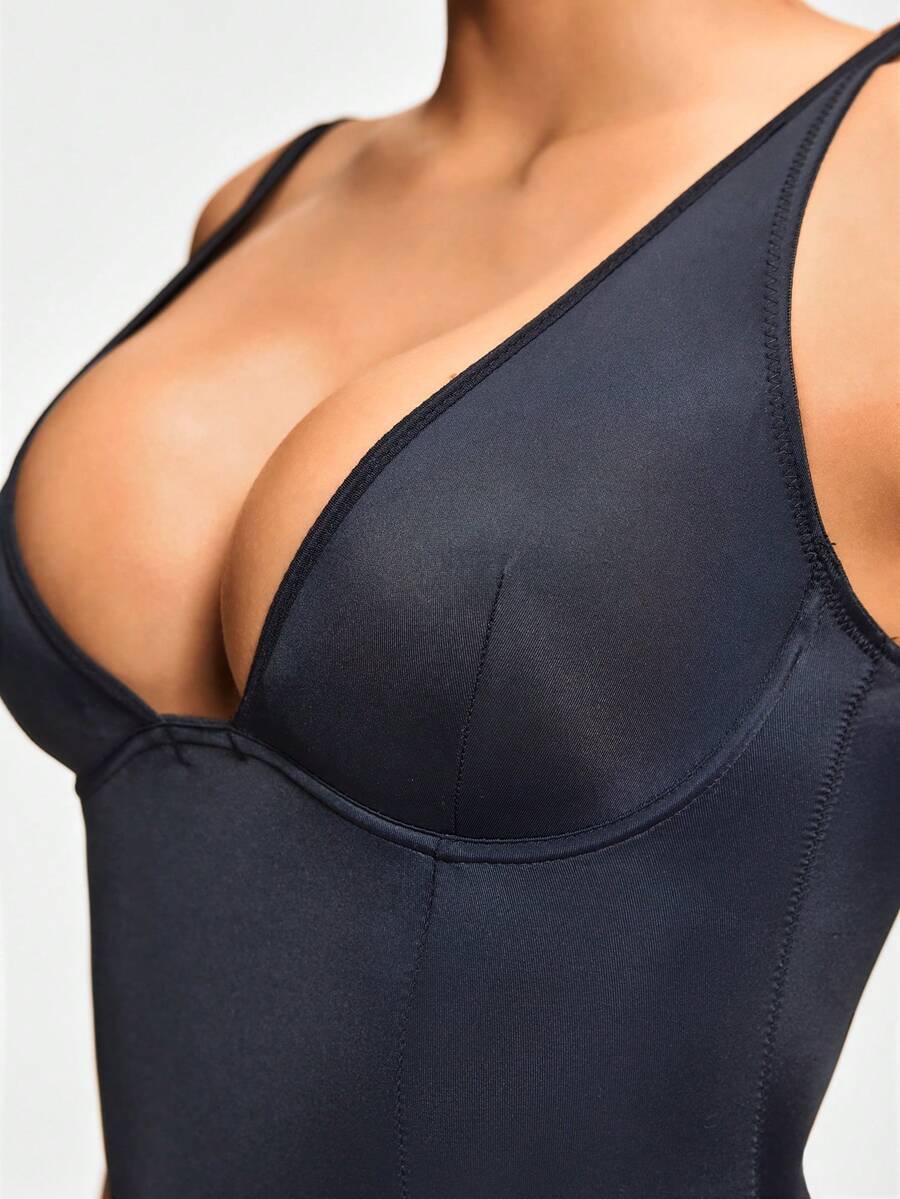 Apricot backless shapewear bodysuit with thong cut, cup details, and high-stretch fabric for light tummy support.