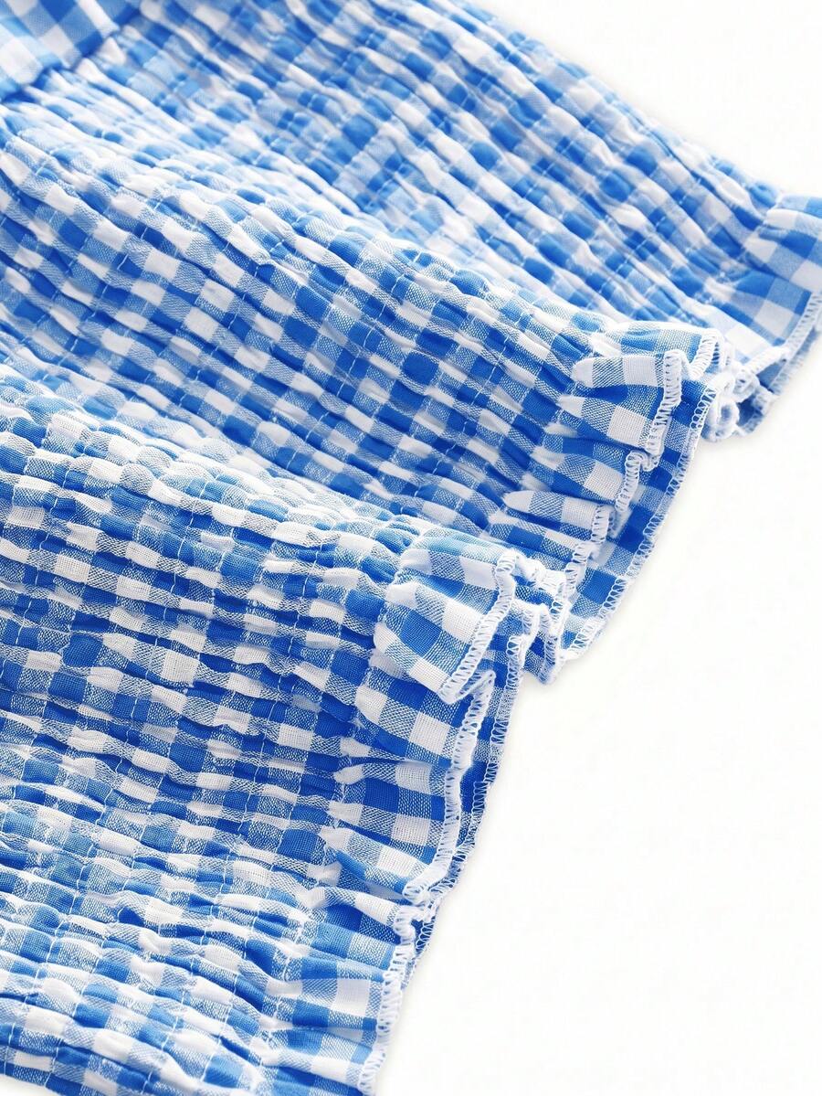 Black plaid halter crop tank top for women featuring a bow detail and slim fit design.