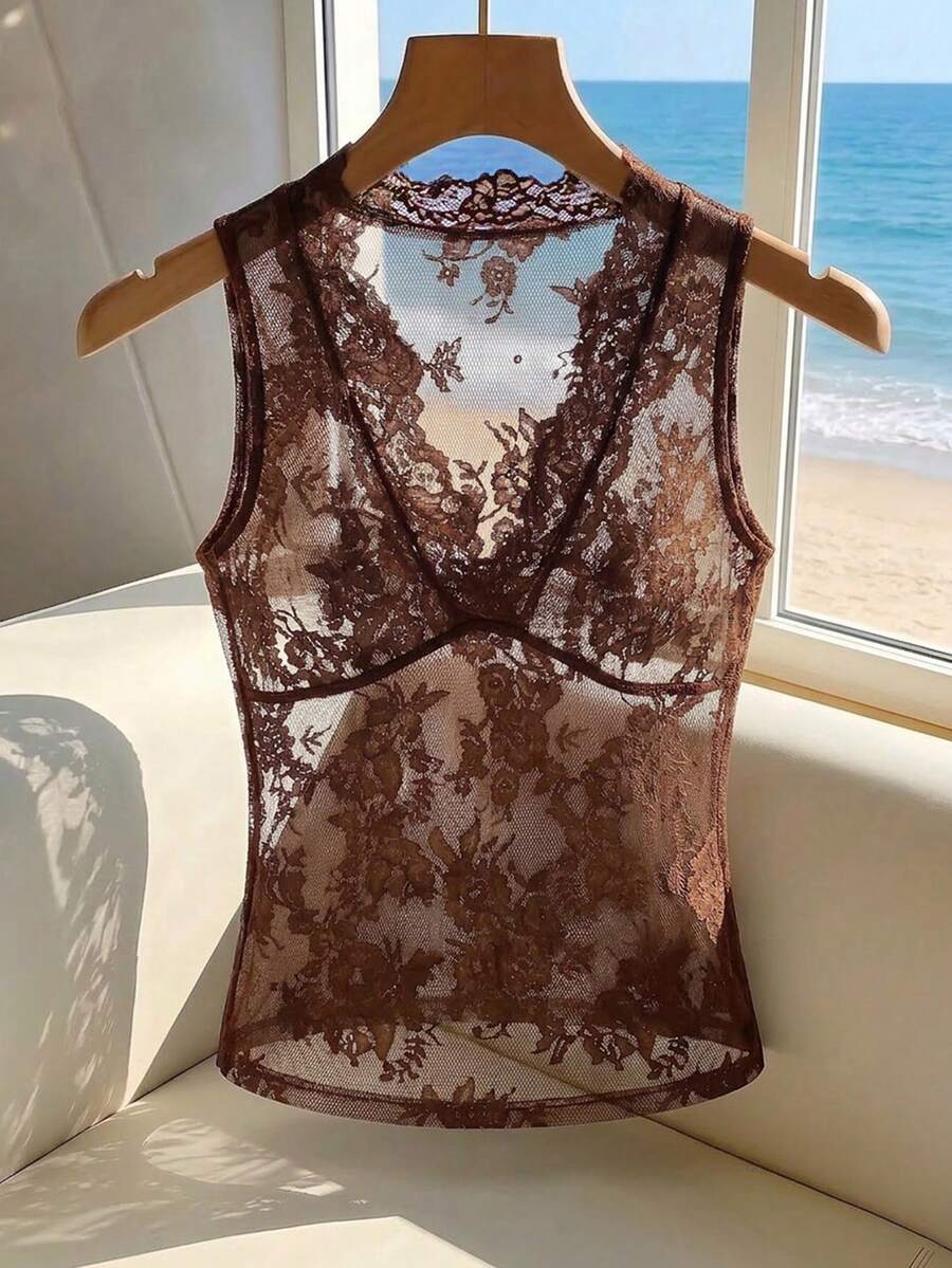 Franclia women's black semi-sheer lace camisole featuring a deep V-neckline with contrast lace trim in a slim fit sleeveless design.