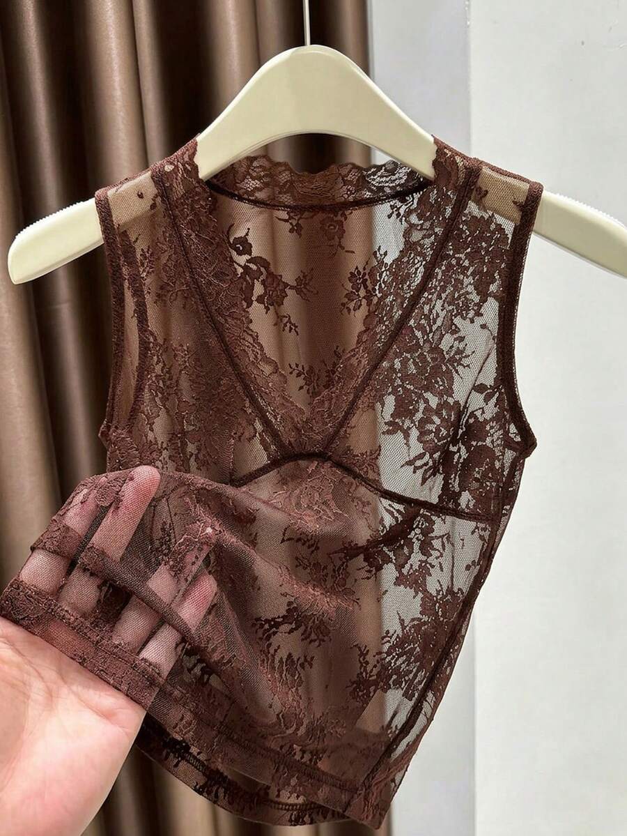 Franclia women's black semi-sheer lace camisole featuring a deep V-neckline with contrast lace trim in a slim fit sleeveless design.