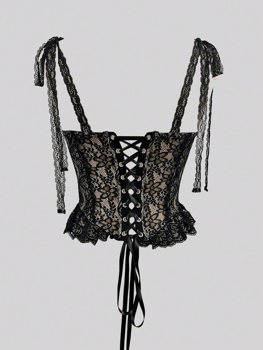 Women's lace camisole top featuring a boned bodice, sweetheart neckline, wide straps, and an asymmetrical crop hem.