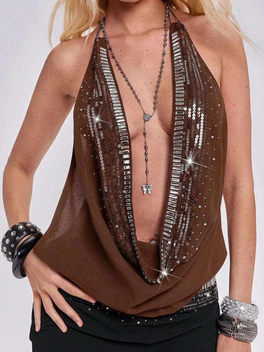 Women wearing a black Y2K draped halter neck backless sequin crop top crafted from semi-sheer chiffon fabric.