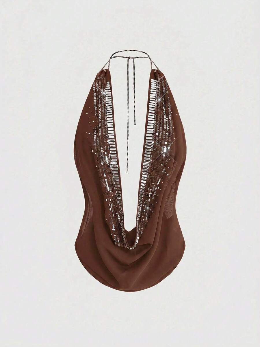 Women wearing a black Y2K draped halter neck backless sequin crop top crafted from semi-sheer chiffon fabric.