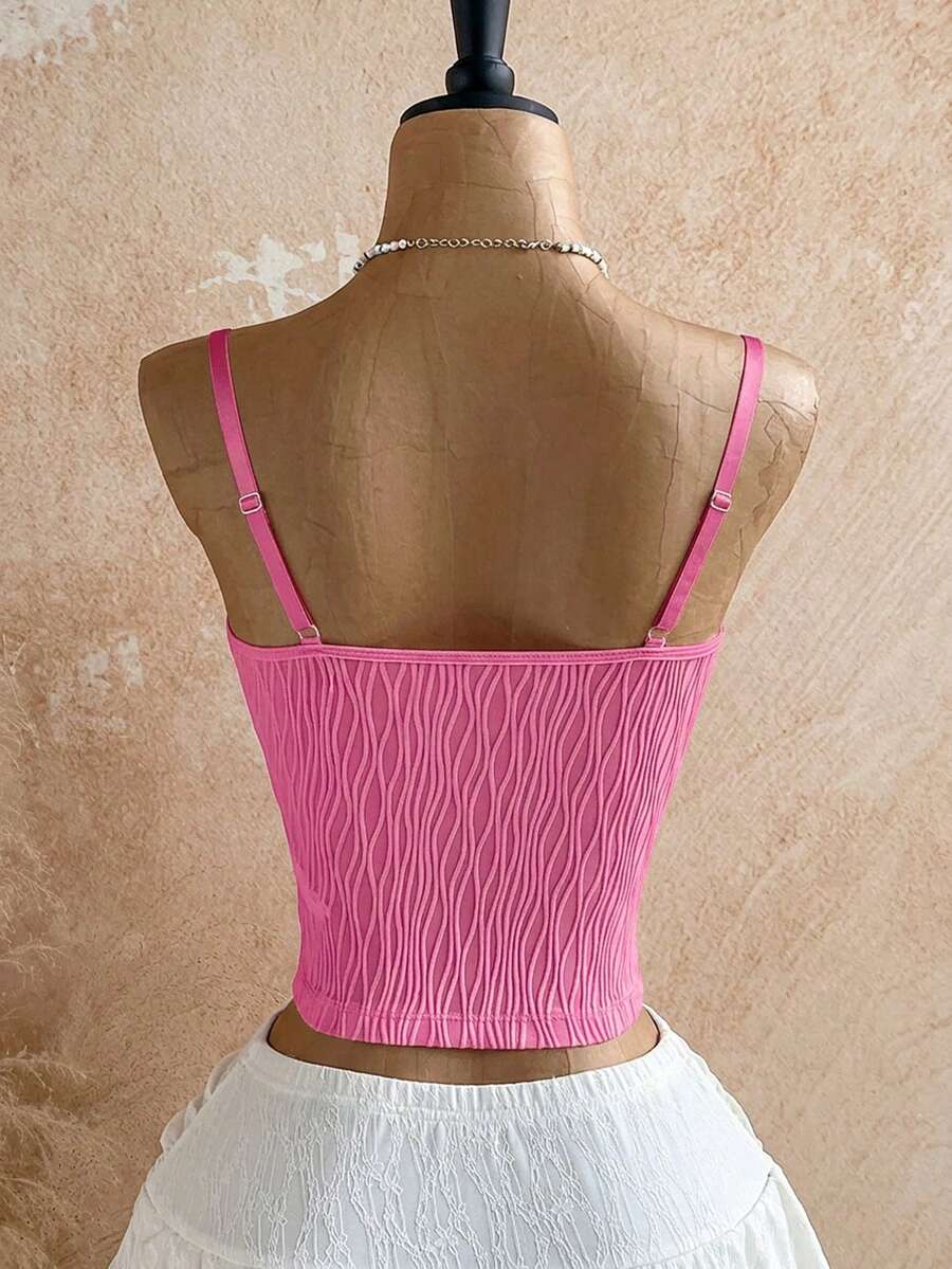 Women's black molded cup camisole top with scallop detailing and spaghetti straps.