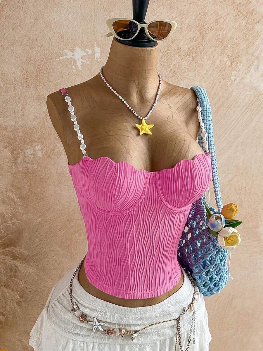 Women's black molded cup camisole top with scallop detailing and spaghetti straps.