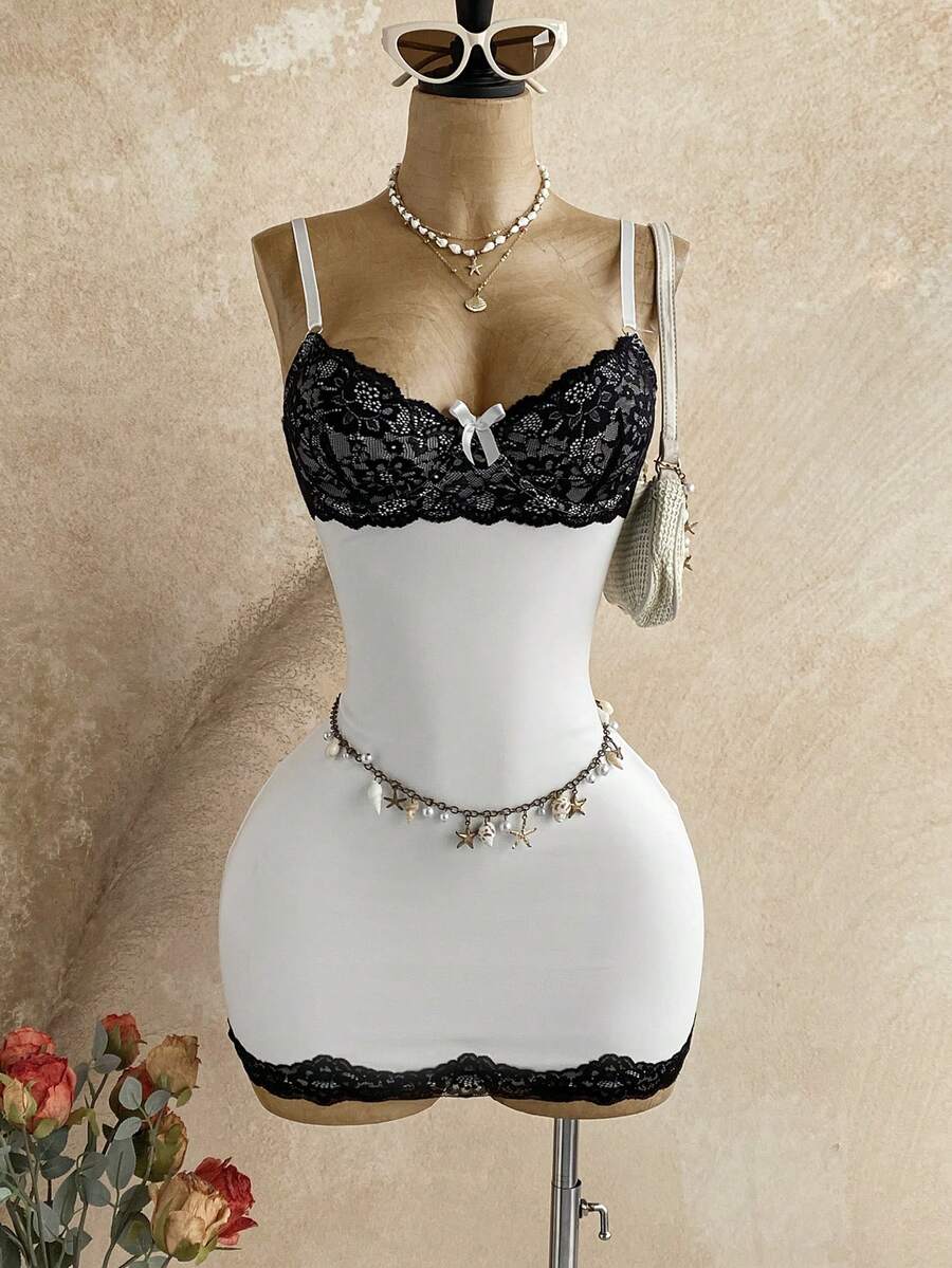 Women's black mesh bodycon mini dress featuring spaghetti straps, contrast lace cup details, backless styling, and a slim fit.