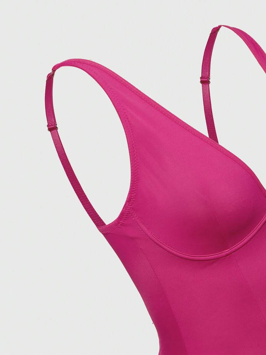 Apricot backless shapewear bodysuit with thong cut, cup details, and high-stretch fabric for light tummy support.