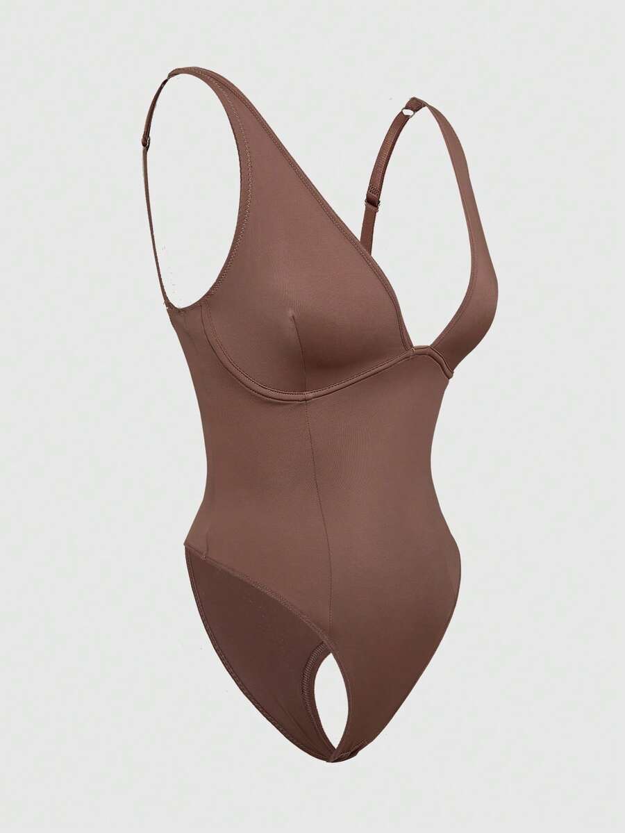 Apricot backless shapewear bodysuit with thong cut, cup details, and high-stretch fabric for light tummy support.