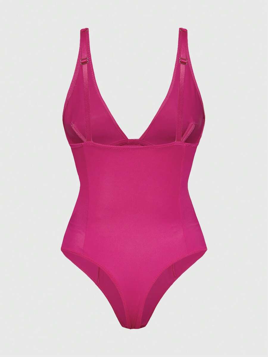 Apricot backless shapewear bodysuit with thong cut, cup details, and high-stretch fabric for light tummy support.