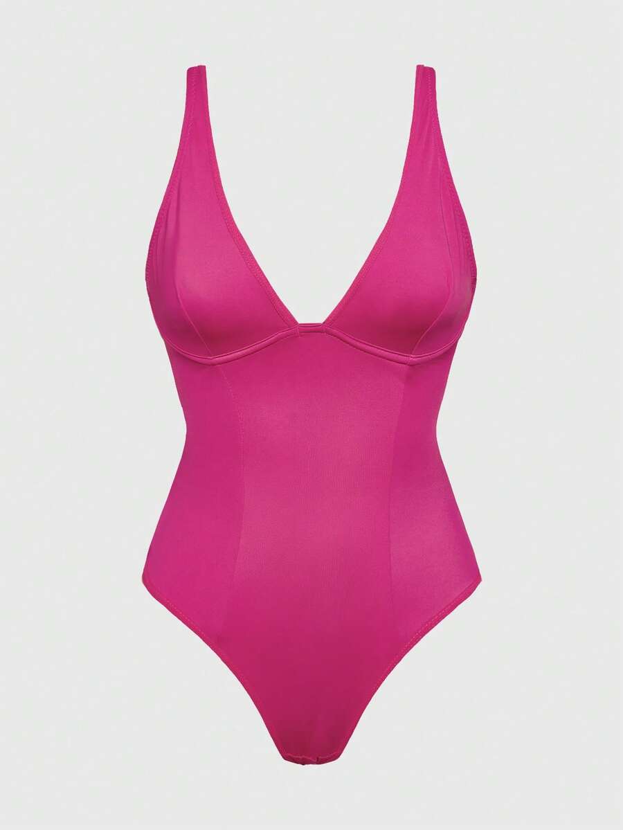 Apricot backless shapewear bodysuit with thong cut, cup details, and high-stretch fabric for light tummy support.