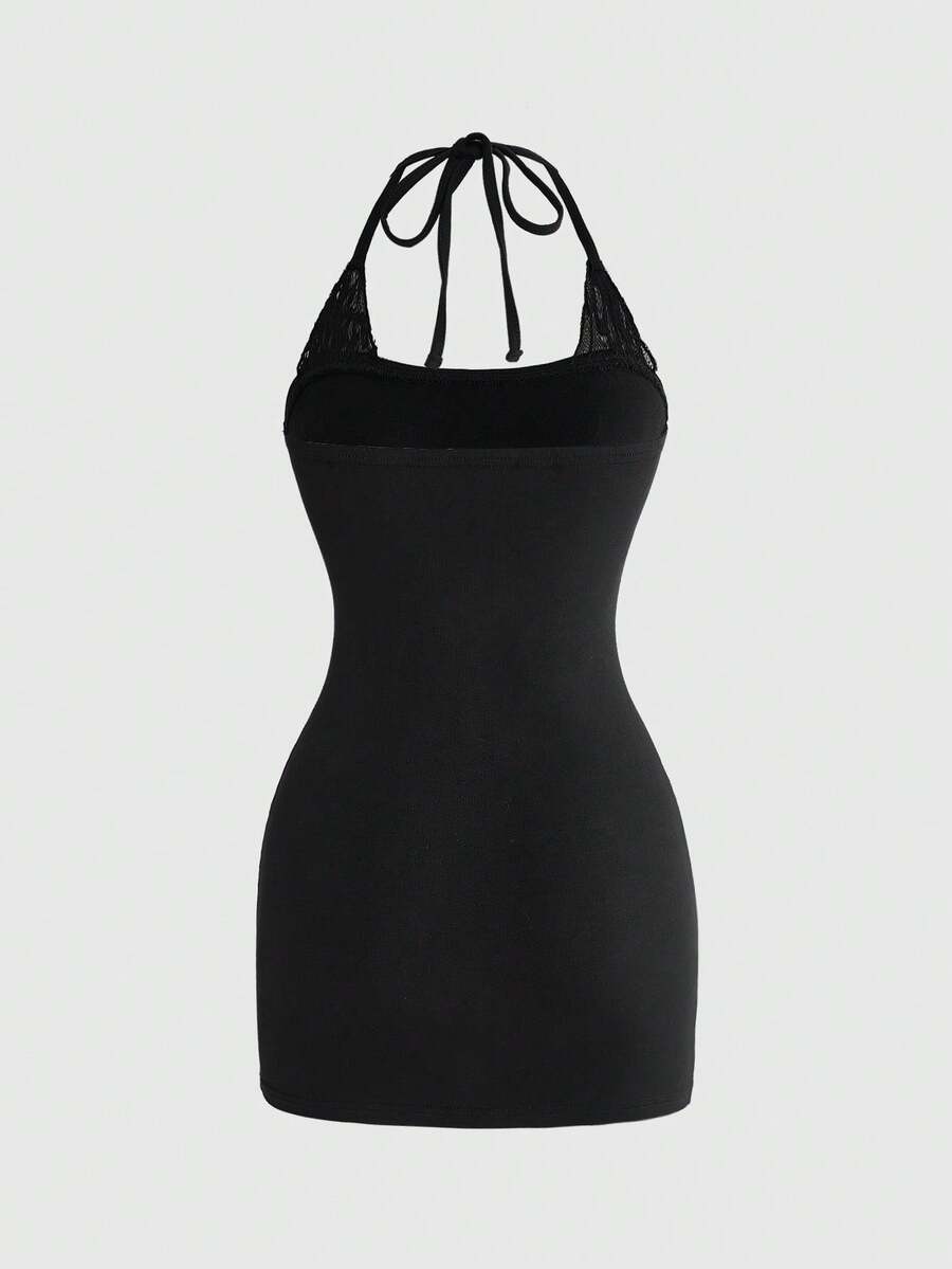 Women's black halter neck mini dress featuring contrast lace detail and a dark goth moth, eye, and skull print in a slim fit pencil silhouette.