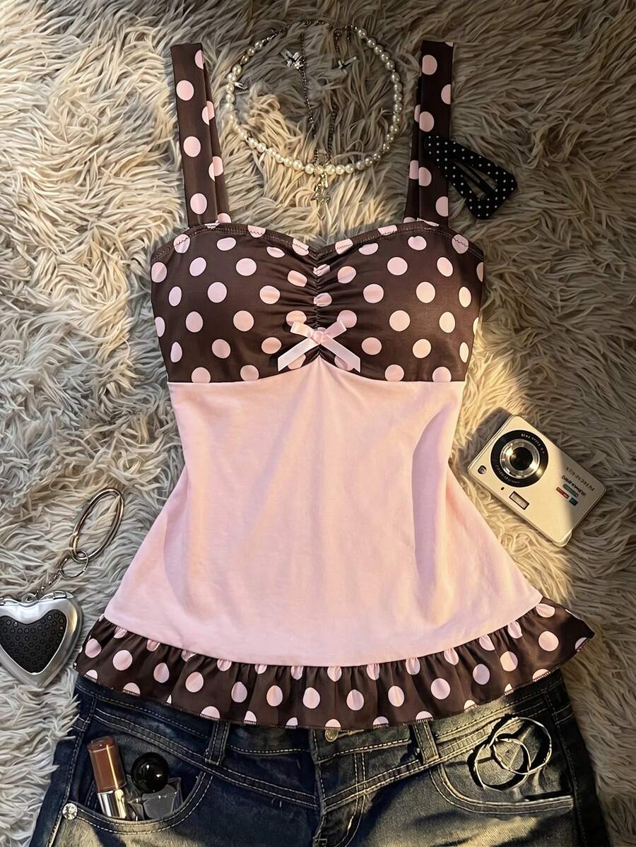 Multicolor women's wide strap tank top featuring polka dot pattern, ruched shirred bodice, and flared ruffle hem.