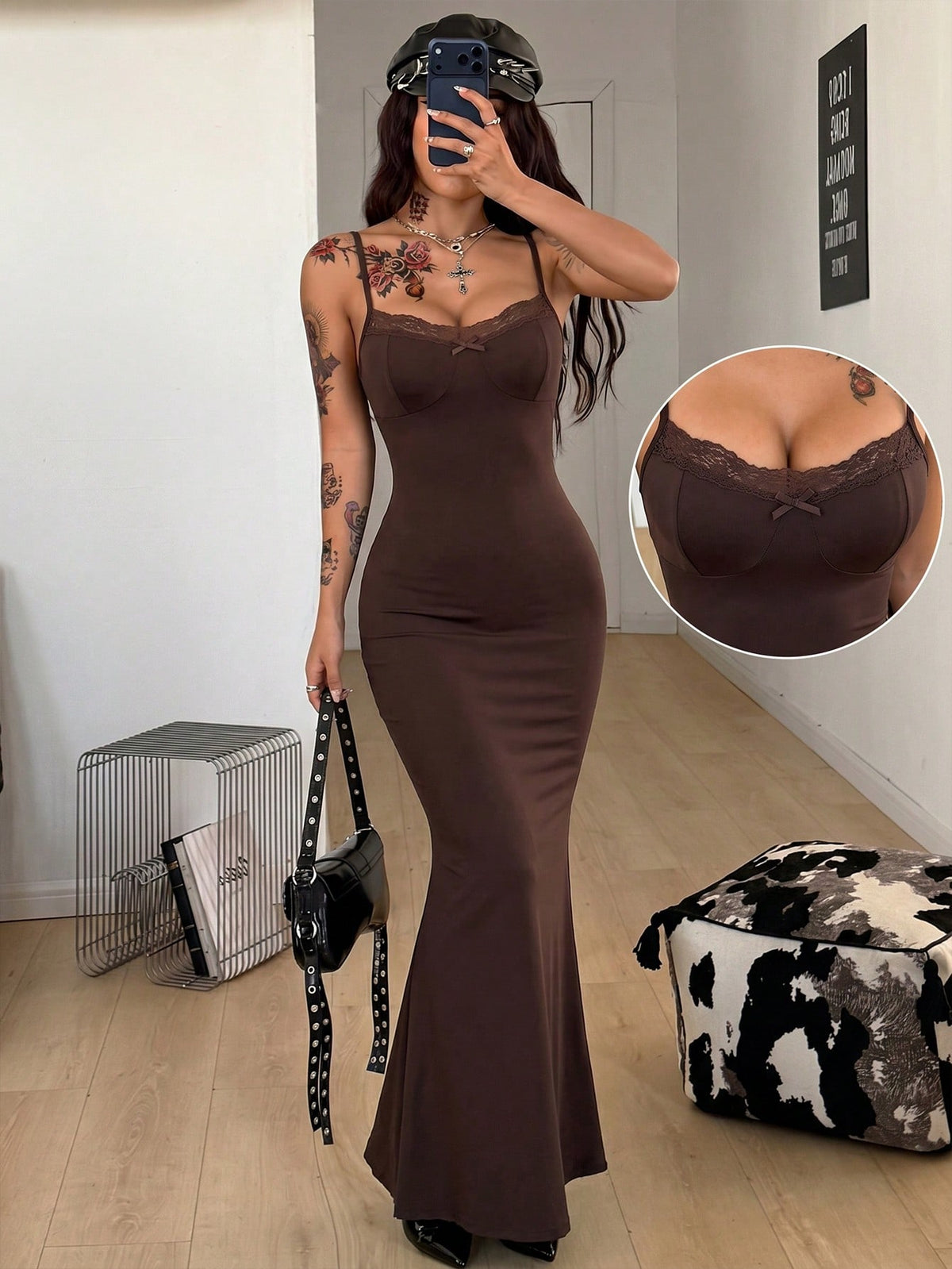 Black backless cami midi dress for women featuring spaghetti straps, slim fit mermaid silhouette, backless button detail, and high stretch knitted fabric.