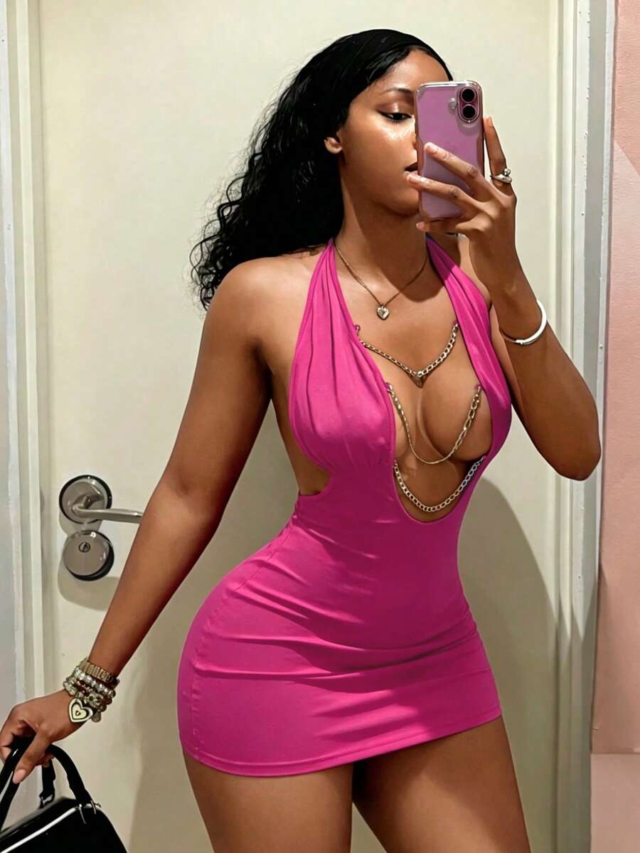 Women's black deep V-neck halter bodycon mini dress featuring a backless design with chain decor detail.
