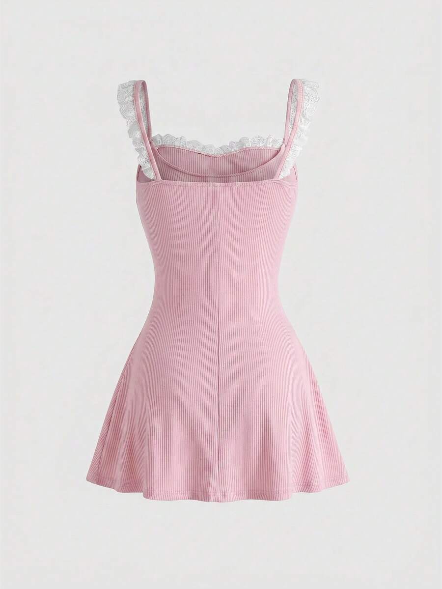 Women's sleeveless black colorblock cami mini dress with shoulder straps, frill detailing, slim fit waist, and flared hem.