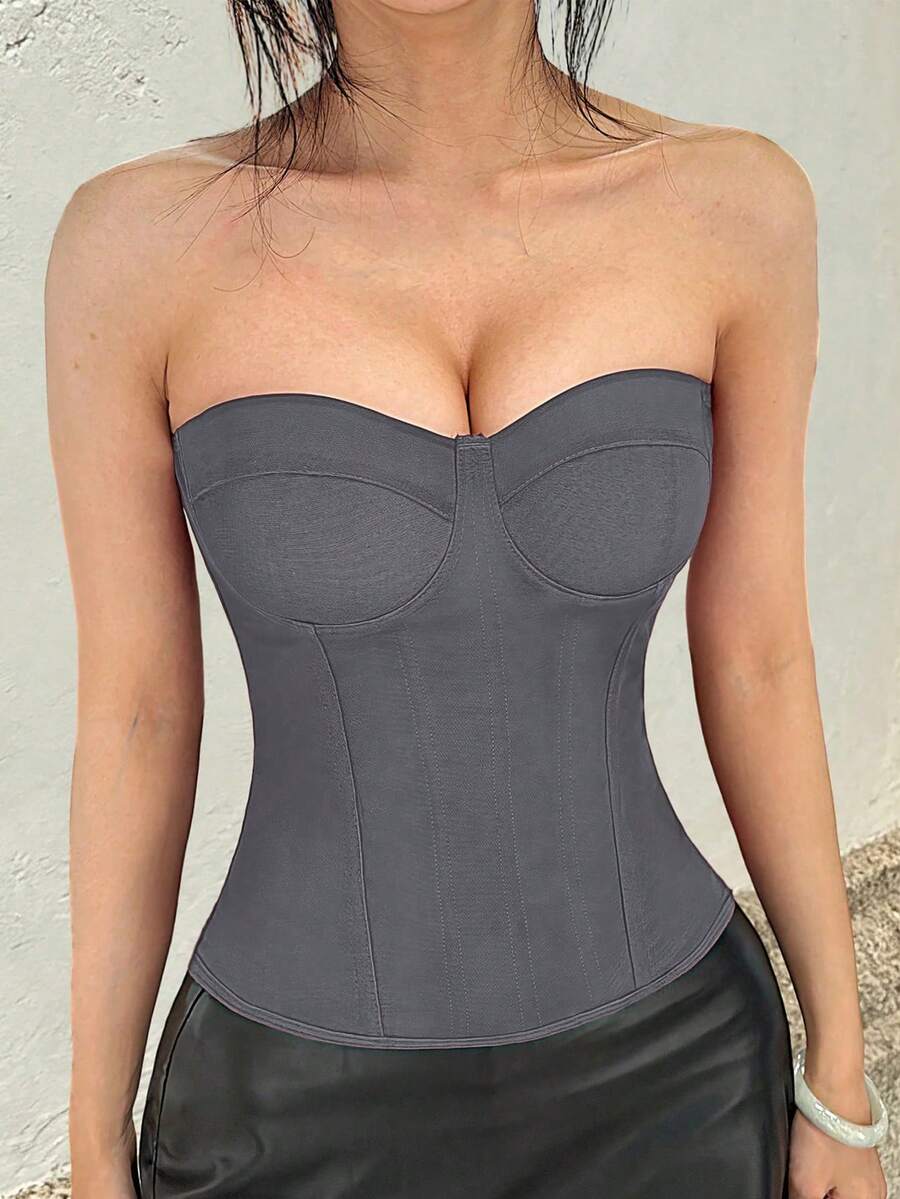 Red strapless corset top with boning and lace-up back, slim fit cropped tube top for women.
