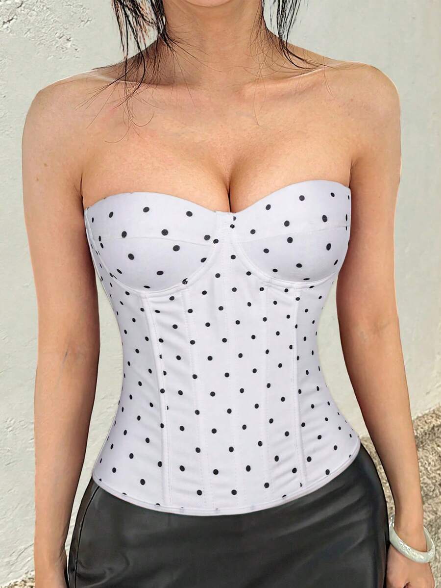 Black strapless corset top with boning, lace-up back, and a cropped slim-fit silhouette for women.