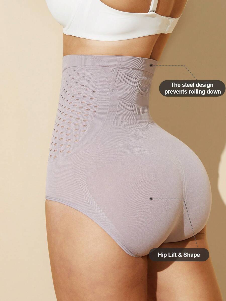 Black women's high waist seamless shaping jumpsuit featuring tummy control and short body shaper design.