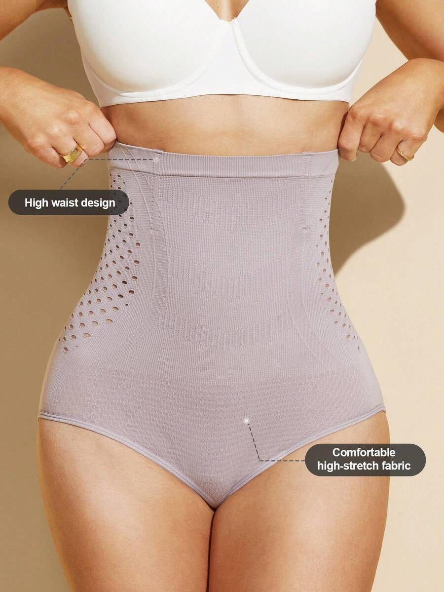 Black women's high waist seamless shaping jumpsuit featuring tummy control and short body shaper design.
