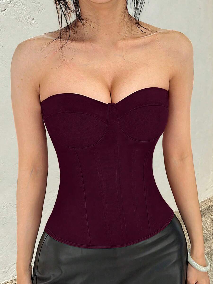 Red strapless corset top with boning and lace-up back, slim fit cropped tube top for women.