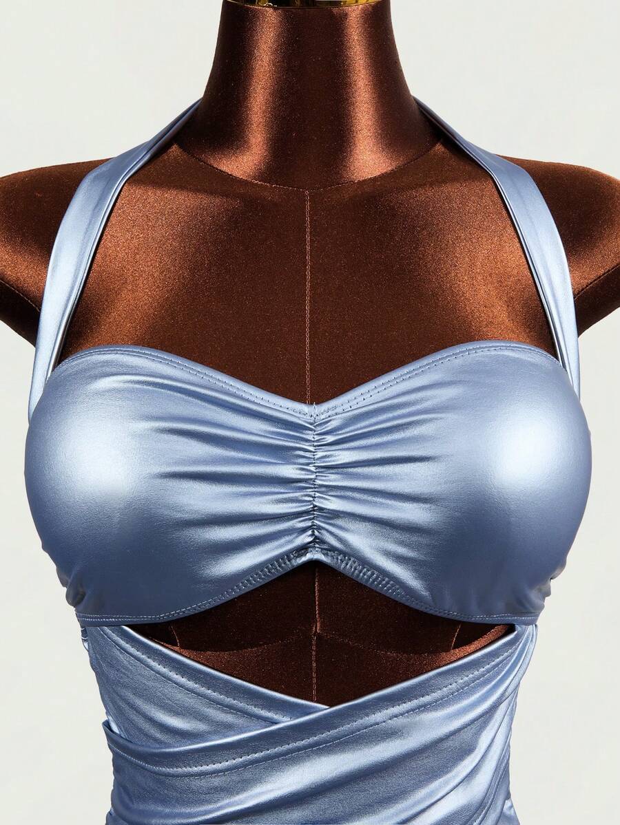 Women's baby blue halter neck bodycon dress featuring cutout detail, sleeveless short length pencil hem, and slim fit knitted fabric.