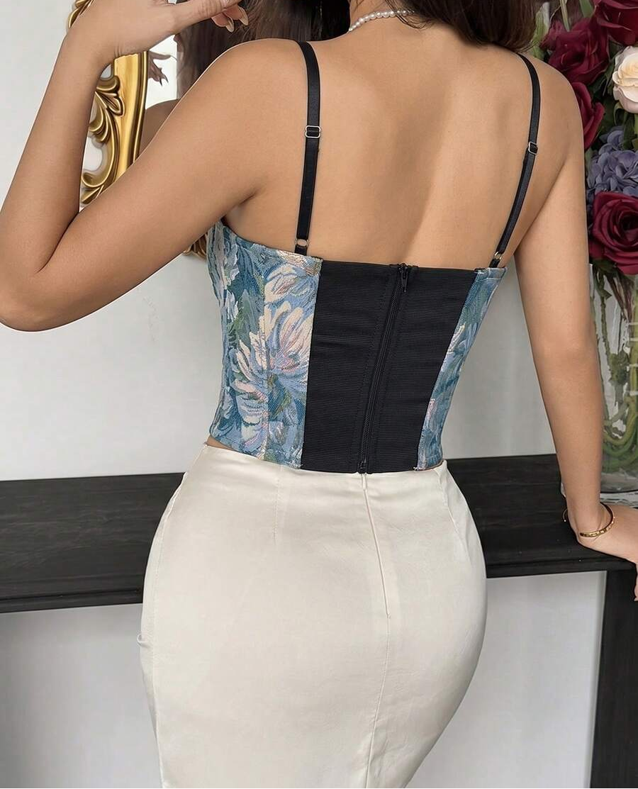 Women's blue floral corset top featuring boned body design, cup details, and shoulder straps.