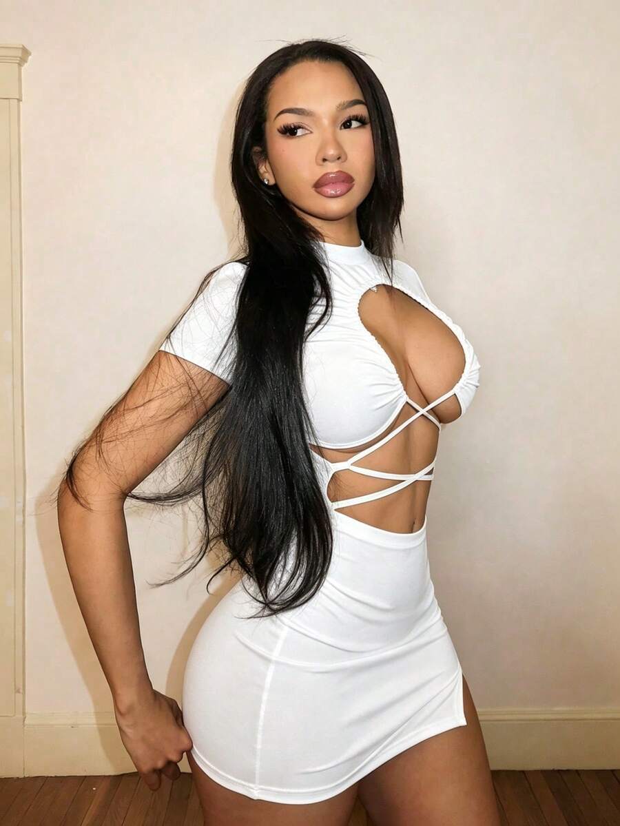 Women's short sleeve bodycon mini dress in black featuring a stand collar, criss cross front detailing, and an asymmetrical hemline.