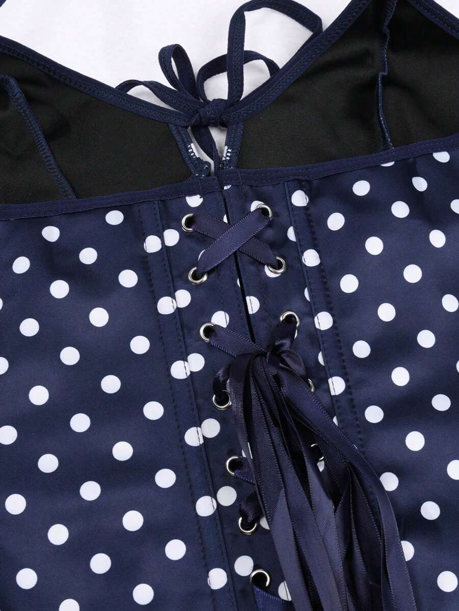 Black satin corset camisole crop top for women with halter neckline, front hook closure, back lace-up detail, and boned waist shaping.