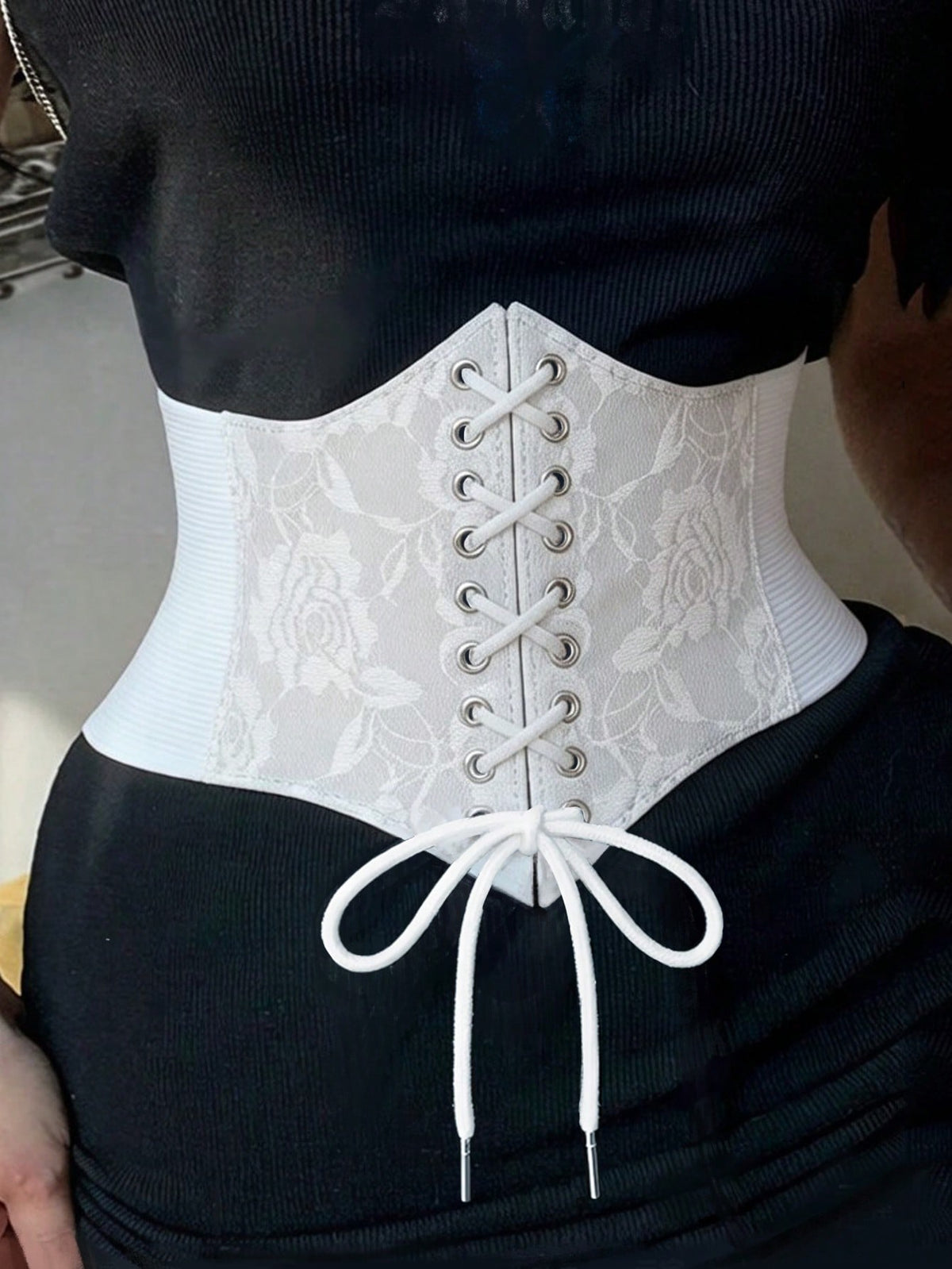 Black lace-up waist cincher with grommet eyelets, baroque pattern, medium stretch, and wide belt design for women.