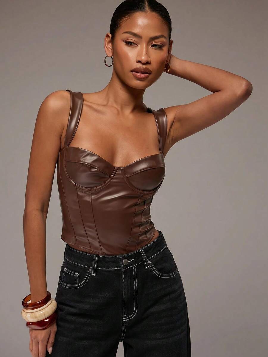 Women's slim fit tank top with rhinestone detail, wide straps, and a short length for casual beach wear.