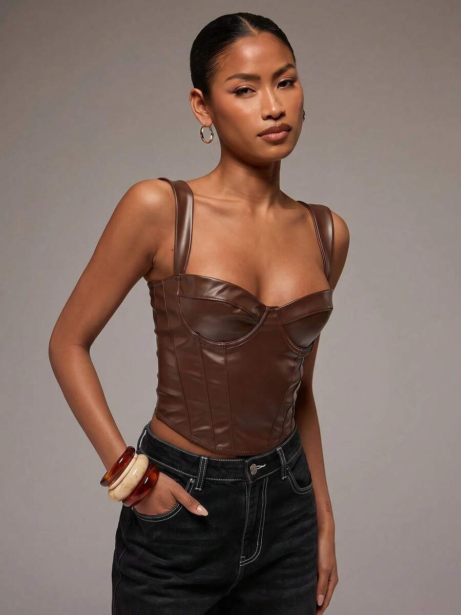 Women's slim fit tank top with rhinestone detail, wide straps, and a short length for casual beach wear.