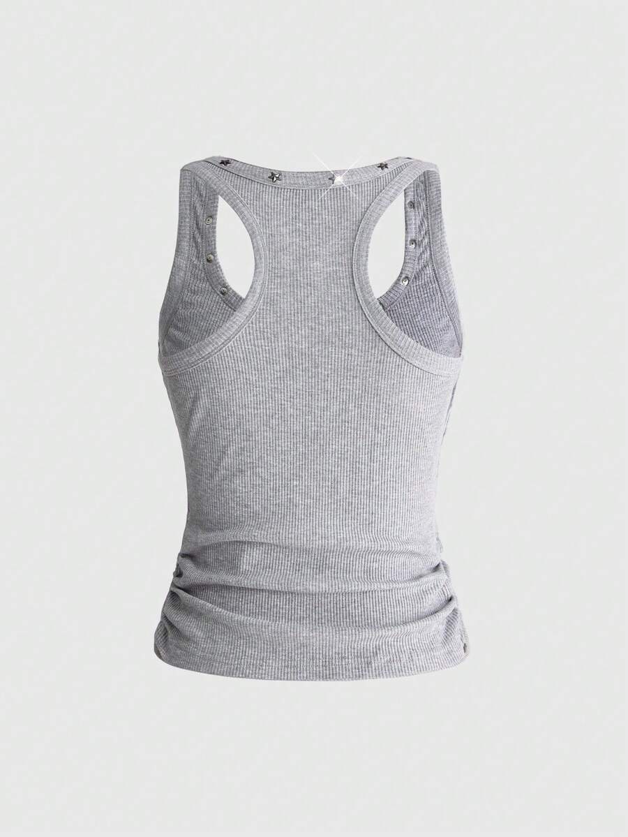 Women's black slim fit tank top featuring a starry sky rivet print and square neckline.