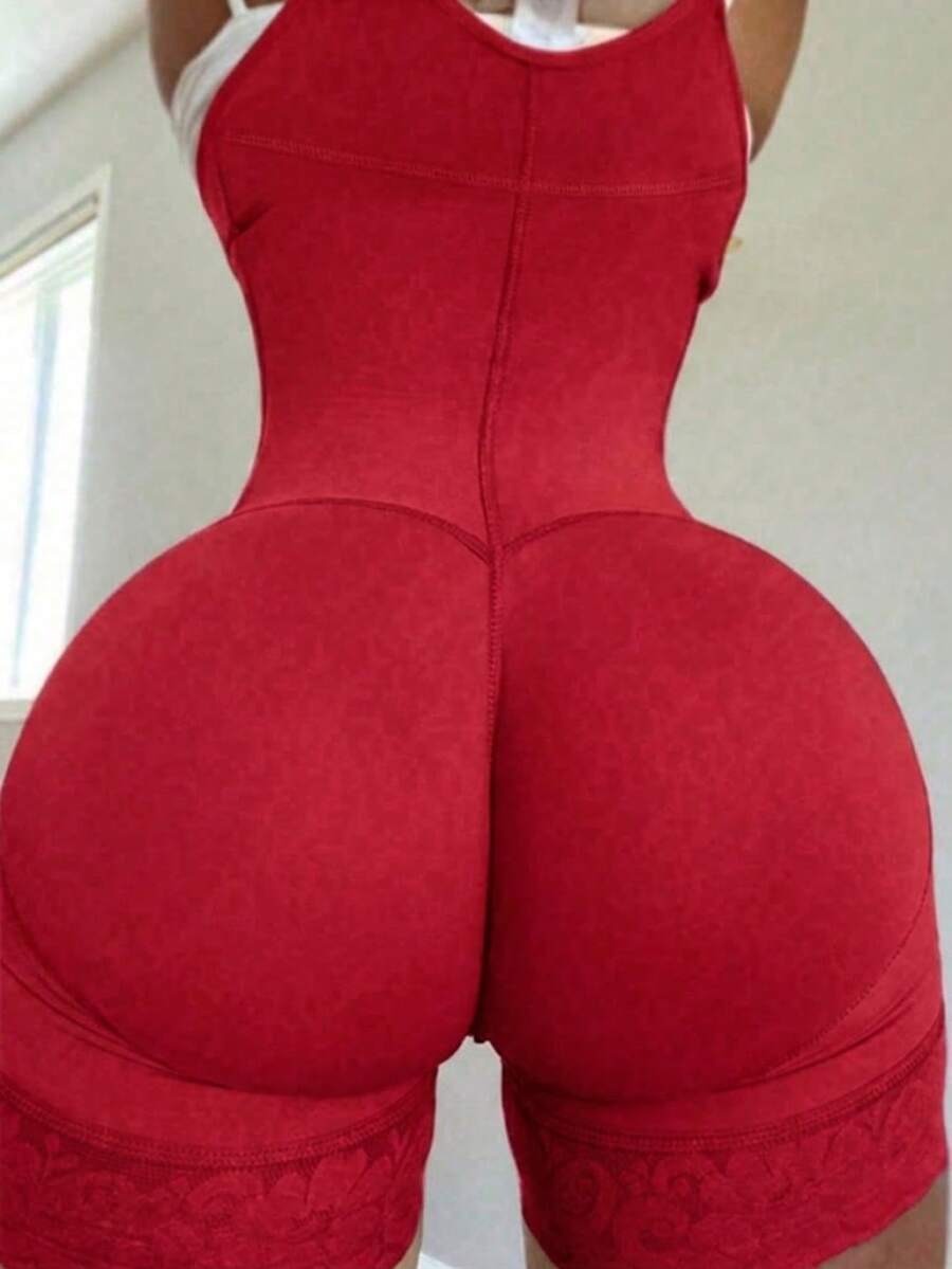 Women's apricot body shaper jumpsuit with 4-row hook and eye front closure and contrast lace details.