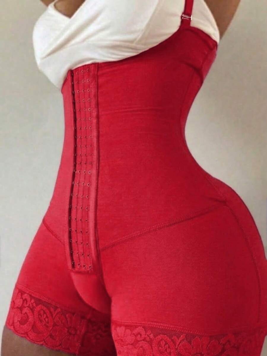 Women's apricot body shaper jumpsuit with 4-row hook and eye front closure and contrast lace details.