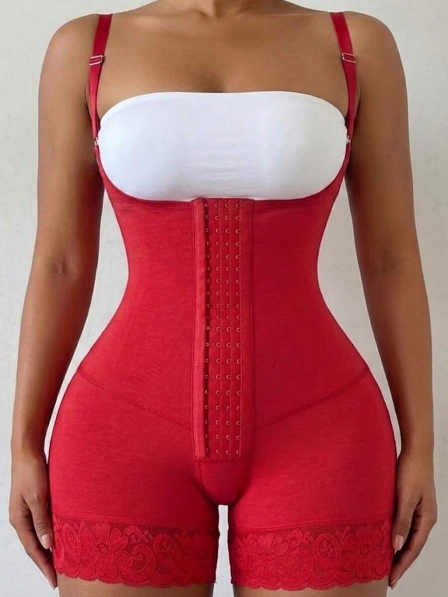 Women's apricot body shaper jumpsuit with 4-row hook and eye front closure and contrast lace details.
