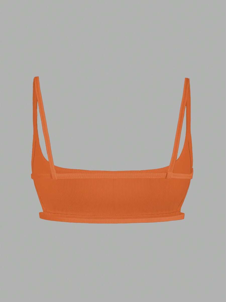 Women's black cropped camisole top with faux crocodile texture, backless spaghetti straps, and matching arm sleeves.