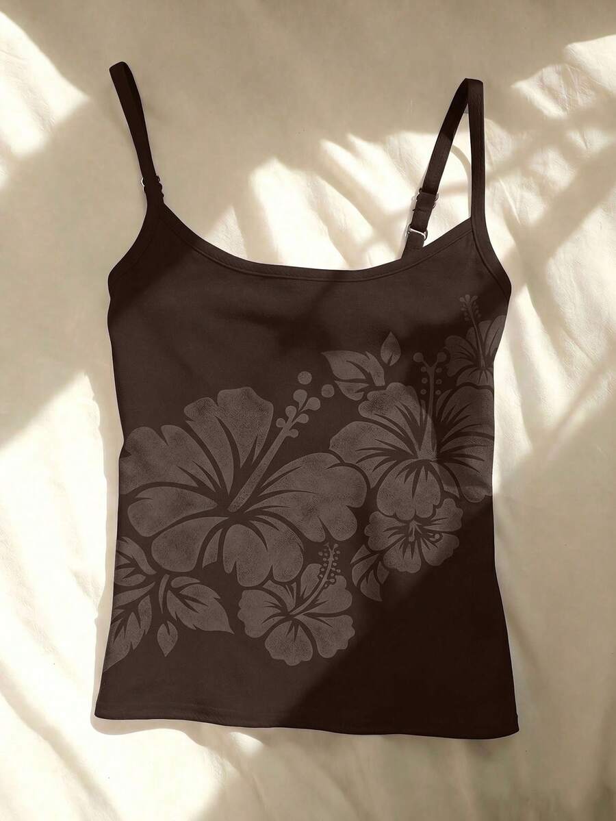 Women's blue floral print spaghetti strap camisole top in a slim fit short length design