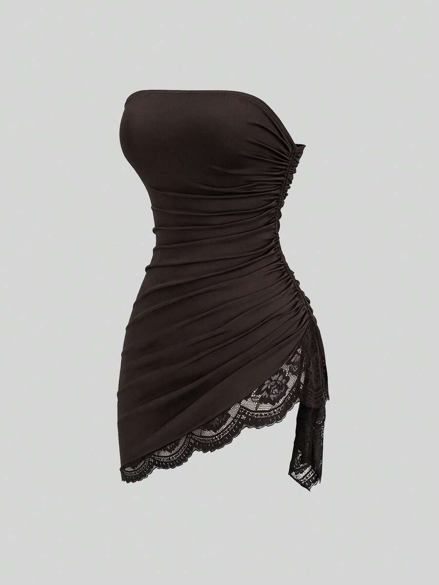 Women's black strapless lace patchwork bodycon mini dress featuring a slim fit design and an asymmetrical hem.