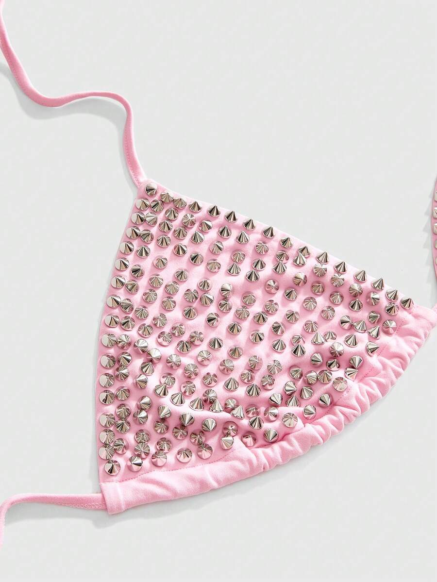 Black studded halter bikini top featuring a backless lace-up design, rhinestone accents, and high-stretch knitted fabric.