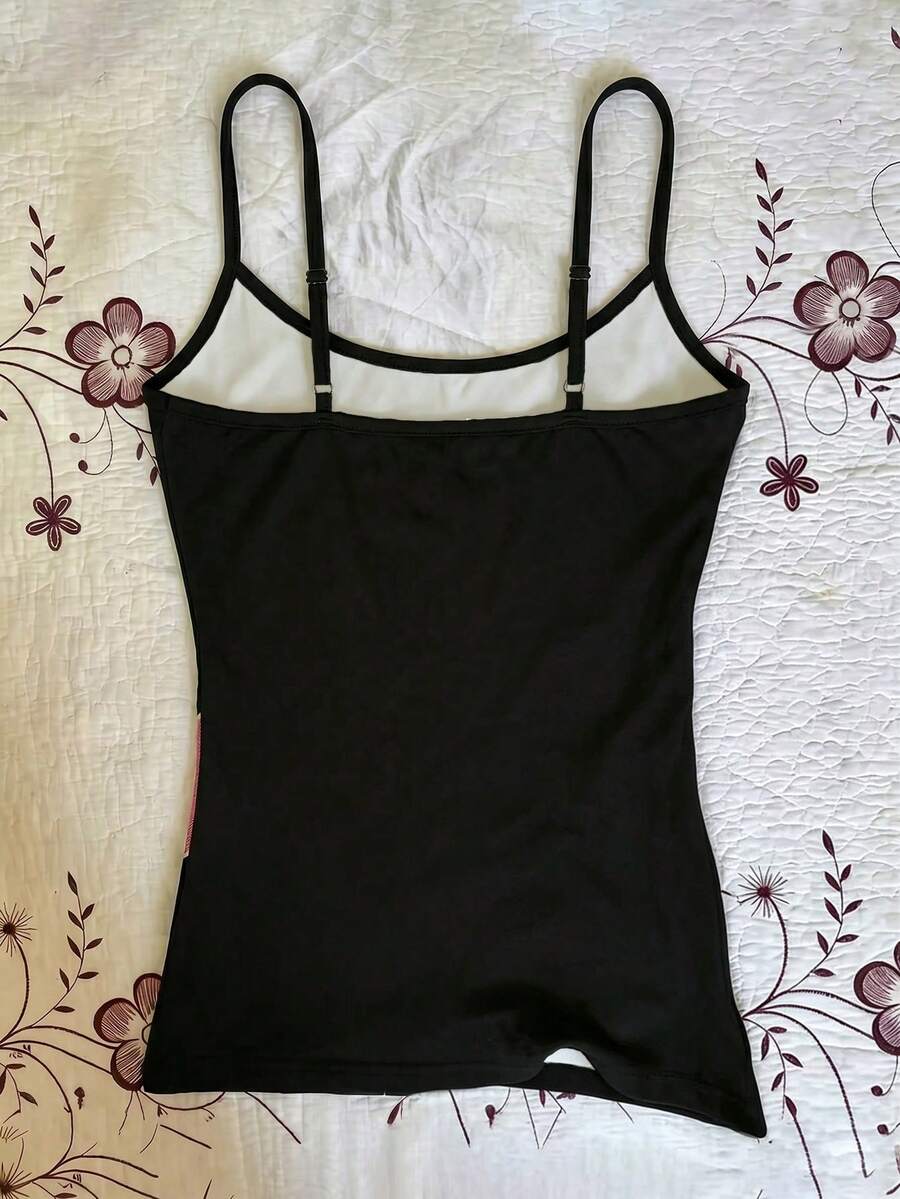 Burgundy cross pattern camisole top featuring spaghetti straps, ring accent, and a backless slim fit design.