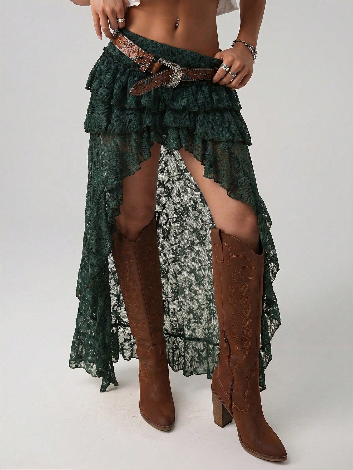 Women's lace tiered asymmetrical maxi skirt featuring a low waist and high slit thigh design.